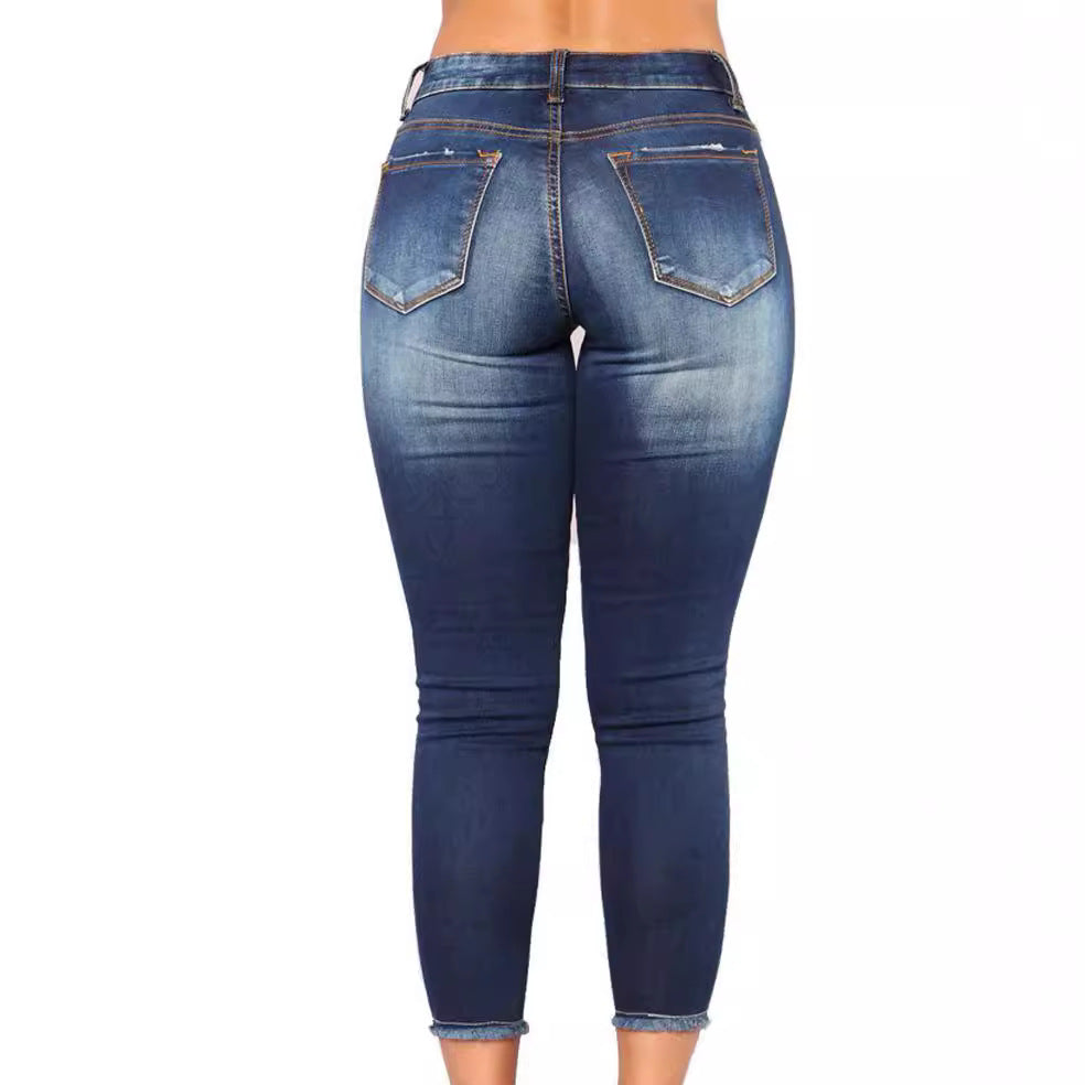 Elastic slim fit ripped small leg jeans