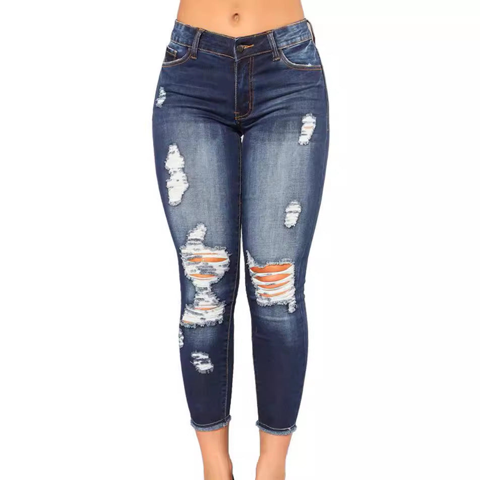 Elastic slim fit ripped small leg jeans